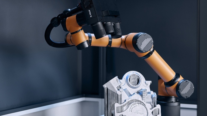 Robotic arm using Zeiss precision measurement equipment on an engine component